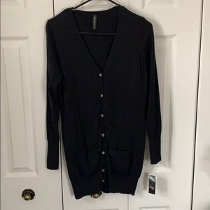 Two cardigans. One black one white. Both new WT